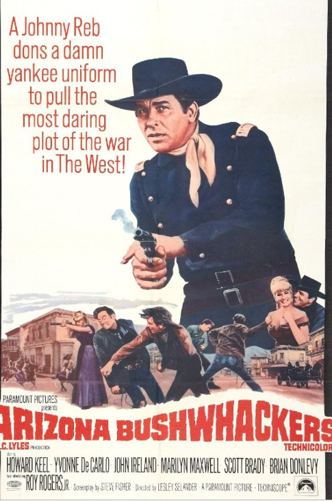 Screenshot from the Arizona Bushwhackers DVD featuring Howard Keel and Yvonne De Carlo in a dramatic scene from the film.