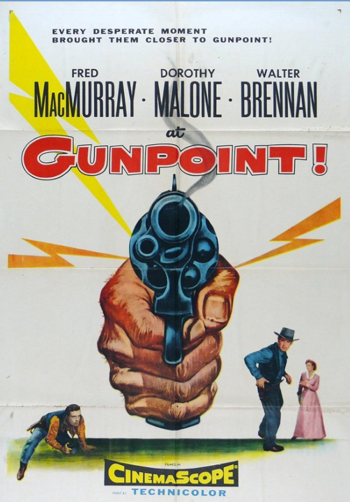 Screenshot from the Gunpoint DVD featuring Audie Murphy and Joan Staley in a dramatic movie scene.